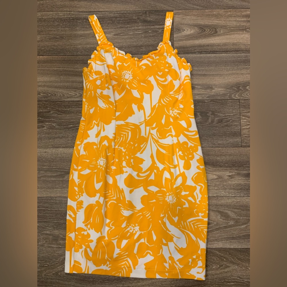 Trina Turk dress.  Size: 10.  Hidden zipper on back.  Cute ruffles!